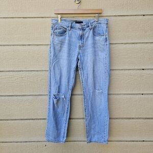 Uniqlo light wash mid-rise relaxed fit jeans busted knees size 10/30 28.5 inseam